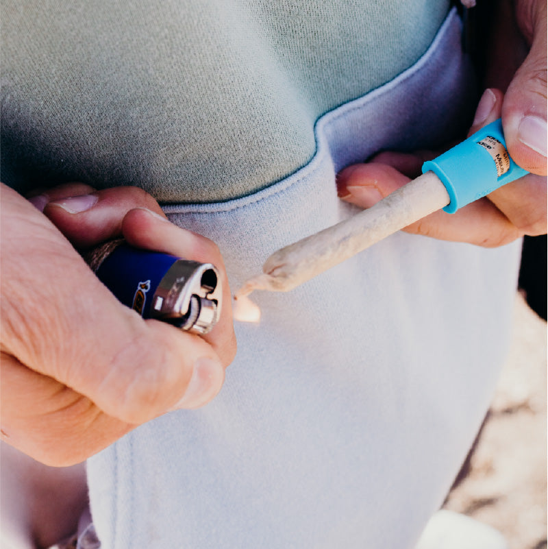lighting up a blunt with mouthpeace mini
