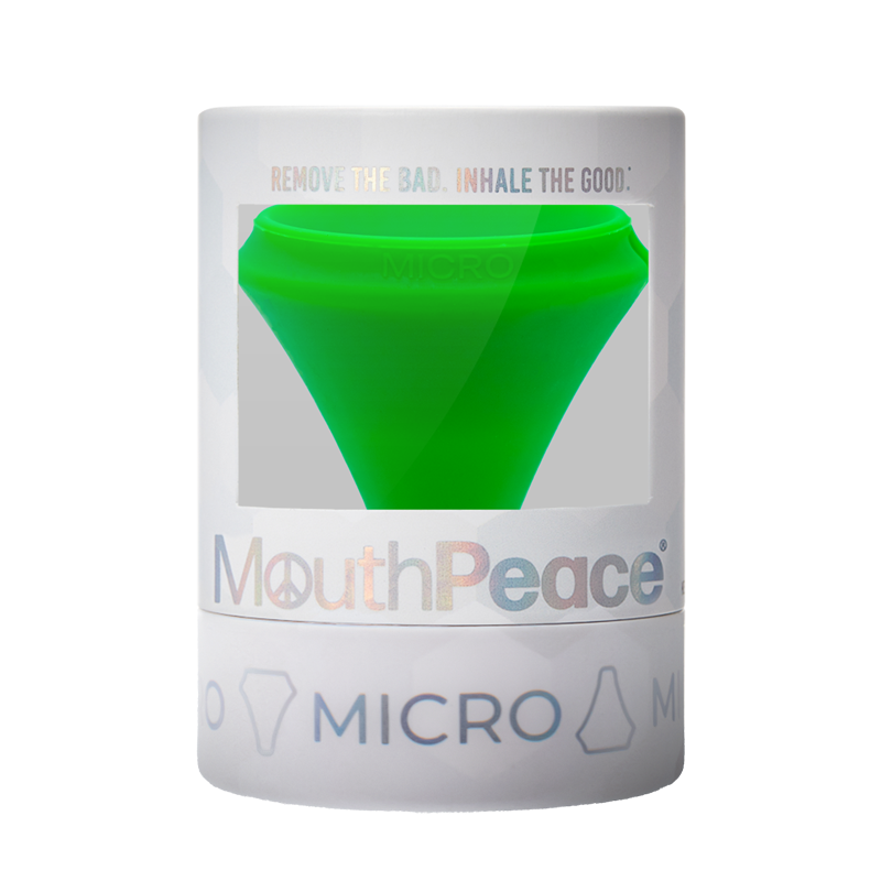 MouthPeace Micro device packaging with green silicone piece on a white background