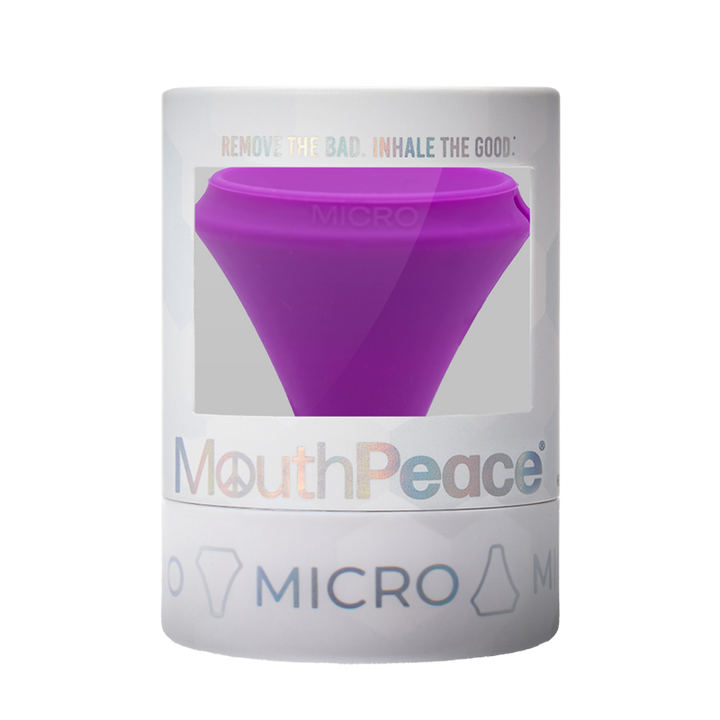 Purple mouthpiece in a transparent packaging with 'MouthPeace' branding on a white background